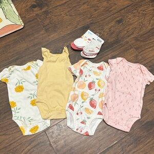 Carter’s onesies and NWT socks bundle